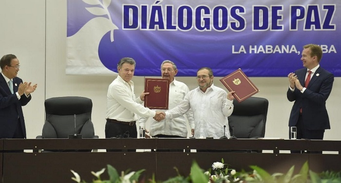 colambia कोलंबिया में विद्रोही संगठन ने हथियार डाले, संघर्षविराम पर सहमति